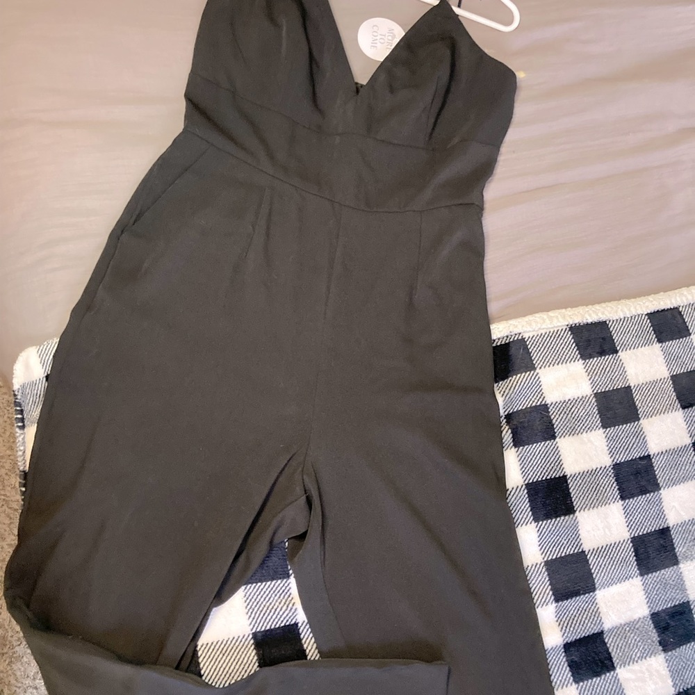 WOMENS ROMPER!! Spagetti strap, zip up back, straight leg. Solid black.